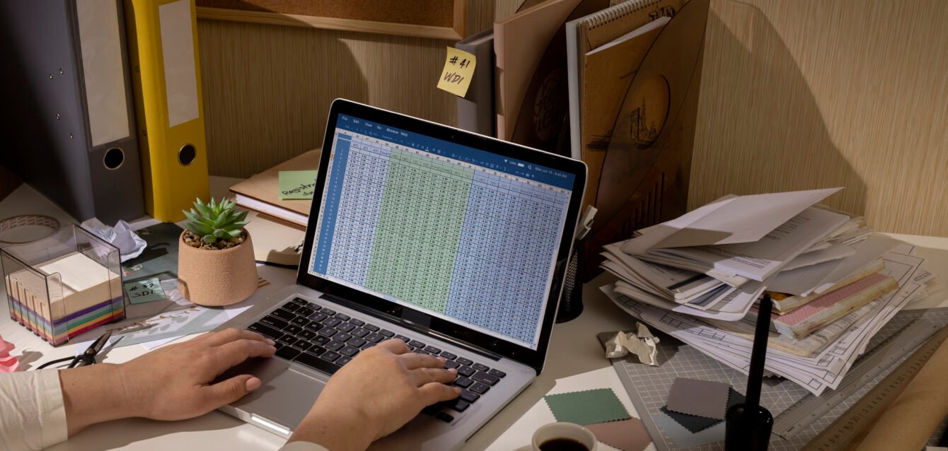 view-messy-office-workspace-with-laptop-device view-messy-office-workspace-with-laptop-device